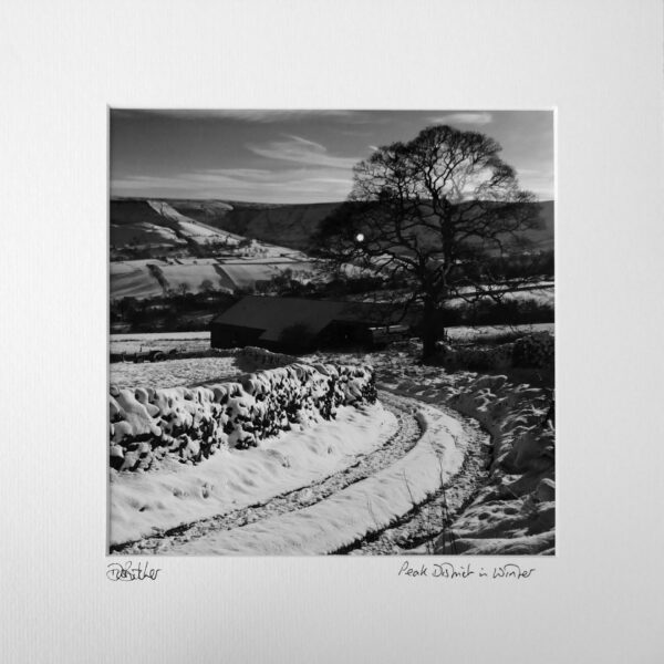 Snowy winter view from Thorney Lee above village of Combs near Chapel-en-le-Frith, near Buxton, Peak District.